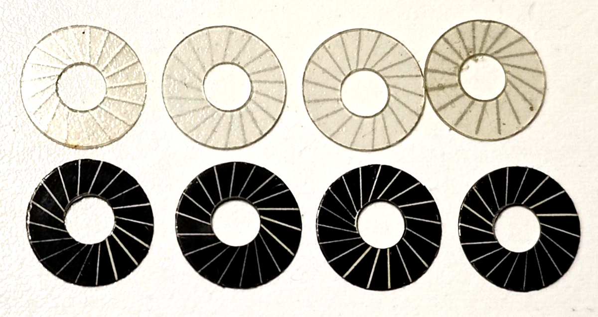 Vintage Spoke wheel inserts Aluminum & acetate.  .0475"OD  .175"ID  Set of four.