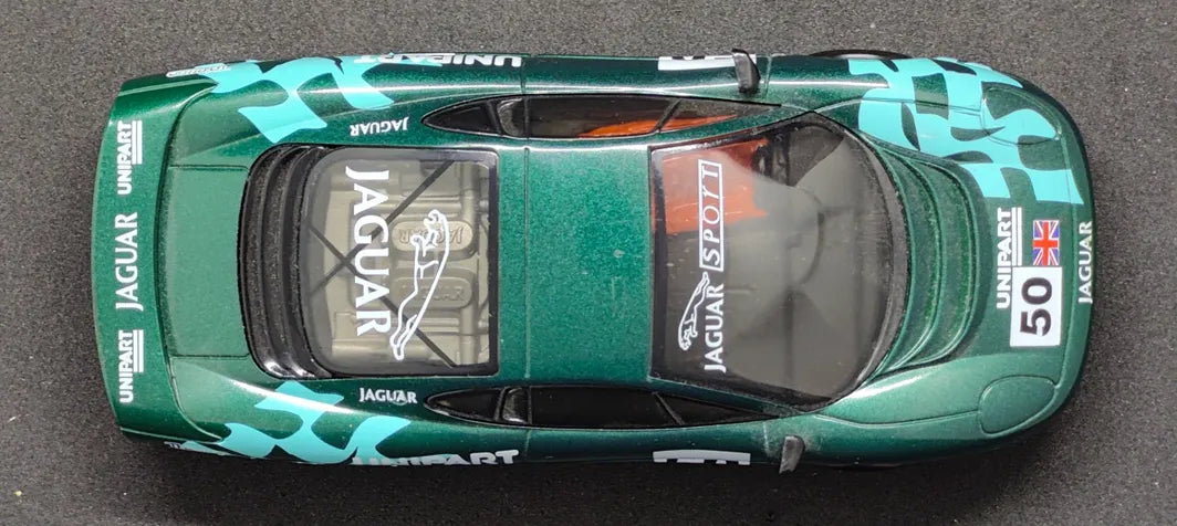 Prototype slot car. Scalextric Jaguar XJ220 on unknown aluminum chassis.