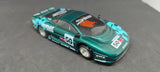 Prototype slot car. Scalextric Jaguar XJ220 on unknown aluminum chassis.