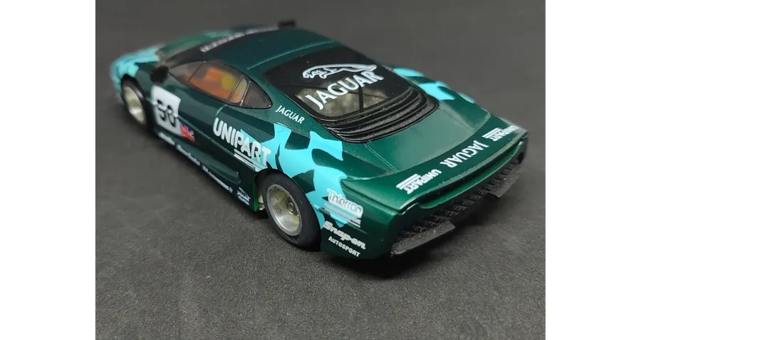 Prototype slot car. Scalextric Jaguar XJ220 on unknown aluminum chassis.