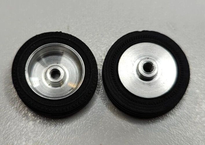 Wheels – 1960's vintage. 24mm dia. x 5.5mm wide. 15/16" X 7/32" 5-40 thread