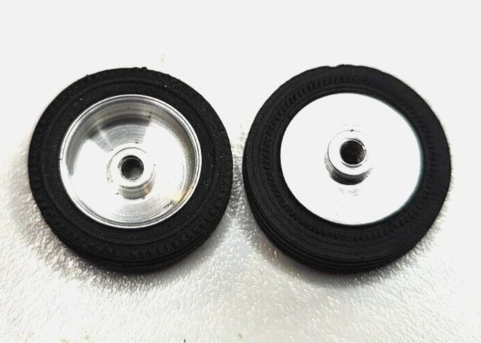 Wheels – 1960's vintage. 24mm dia. x 5.5mm wide. 15/16" X 7/32" 5-40 thread