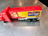 Hollywood Video red and yellow advertising truck front angle