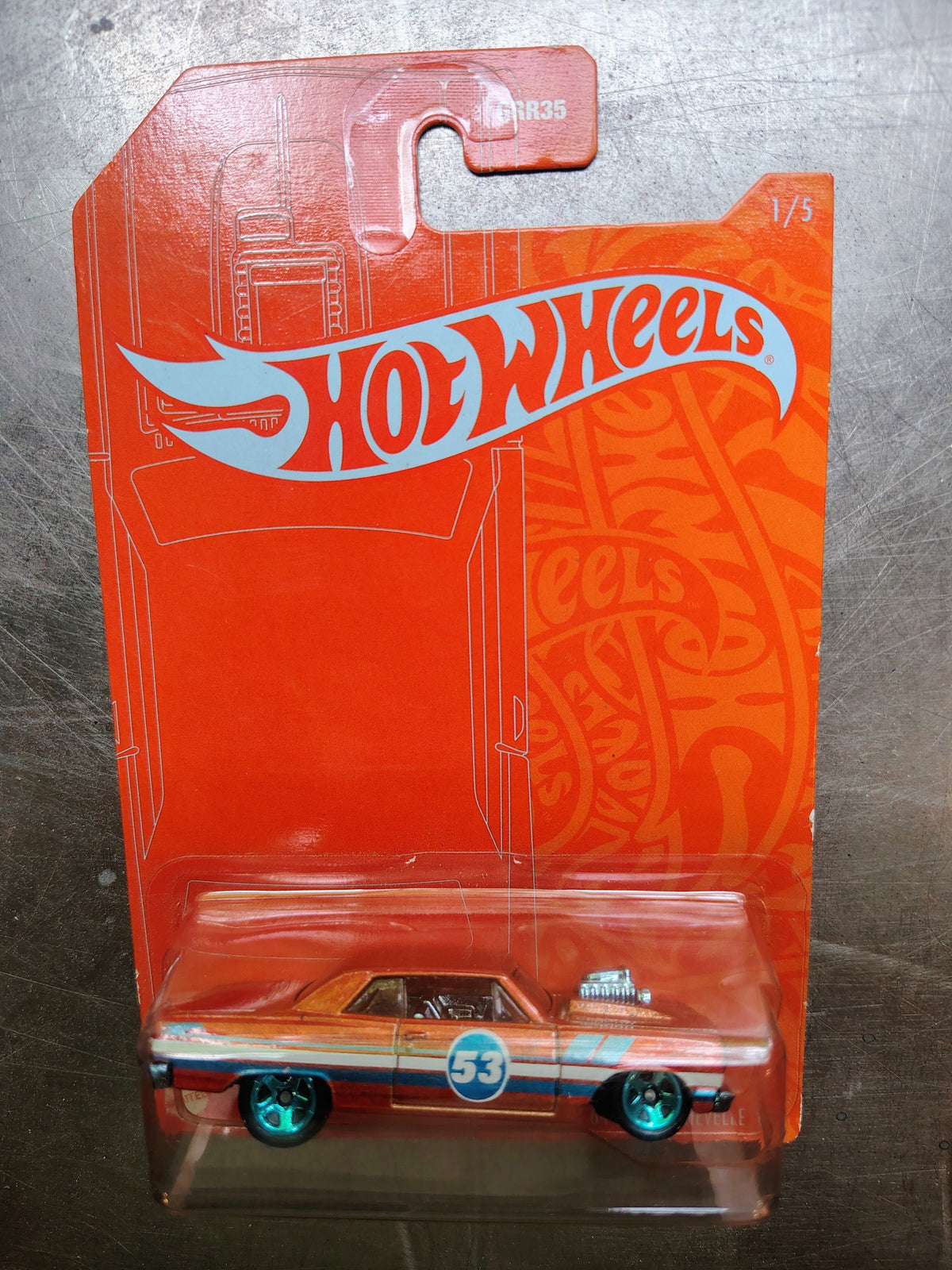 Actual included collectible 1: Hot Wheels orange-background collector-card muscle car with race number 53.