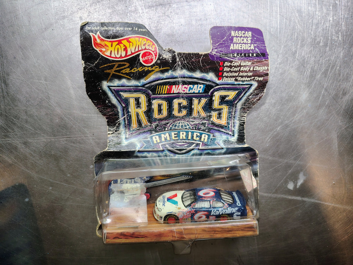 Actual included collectible 4: Hot Wheels NASCAR Rock 5 America Valvoline racecar with the themed miniature guitar accessory, in the original