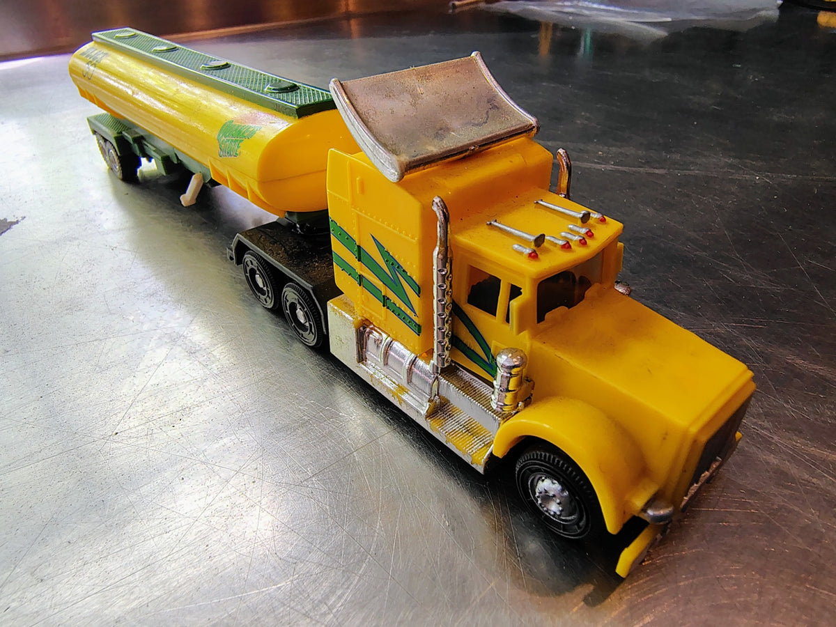 Quaker State Slick 50 diecast tanker yellow tractor front view
