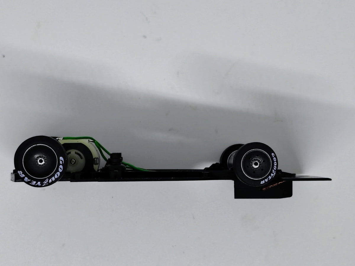 MR Slotcar MR1033 Shadow DN4 chassis side profile showing ultra-low guide and drivetrain