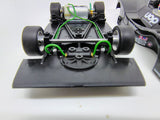 MR Slotcar MR1033 Shadow DN4 front chassis and unique low-profile circular-track guide close-up