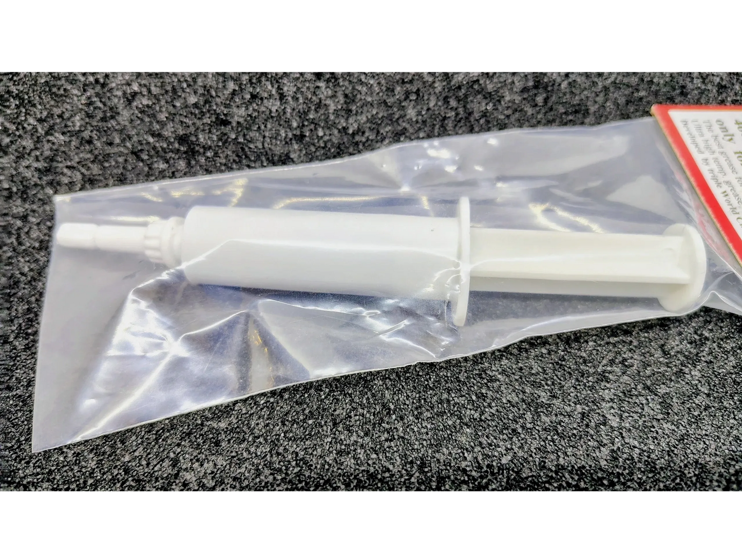 NSR 1409 Special grease for slot car metal gears in syringe applicator.