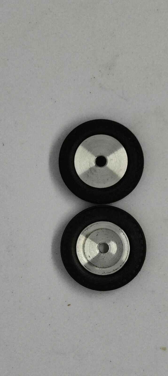 Wheels, vintage. 21mm dia. x 5.75mm wide. 13/16" X 3/16" 5-40 threaded axle.
