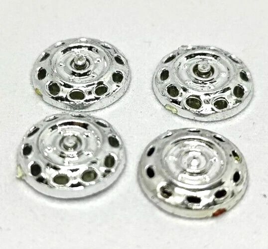 Strombecker 1/32 Jaguar wheel inserts .4" diameter. Set of four.