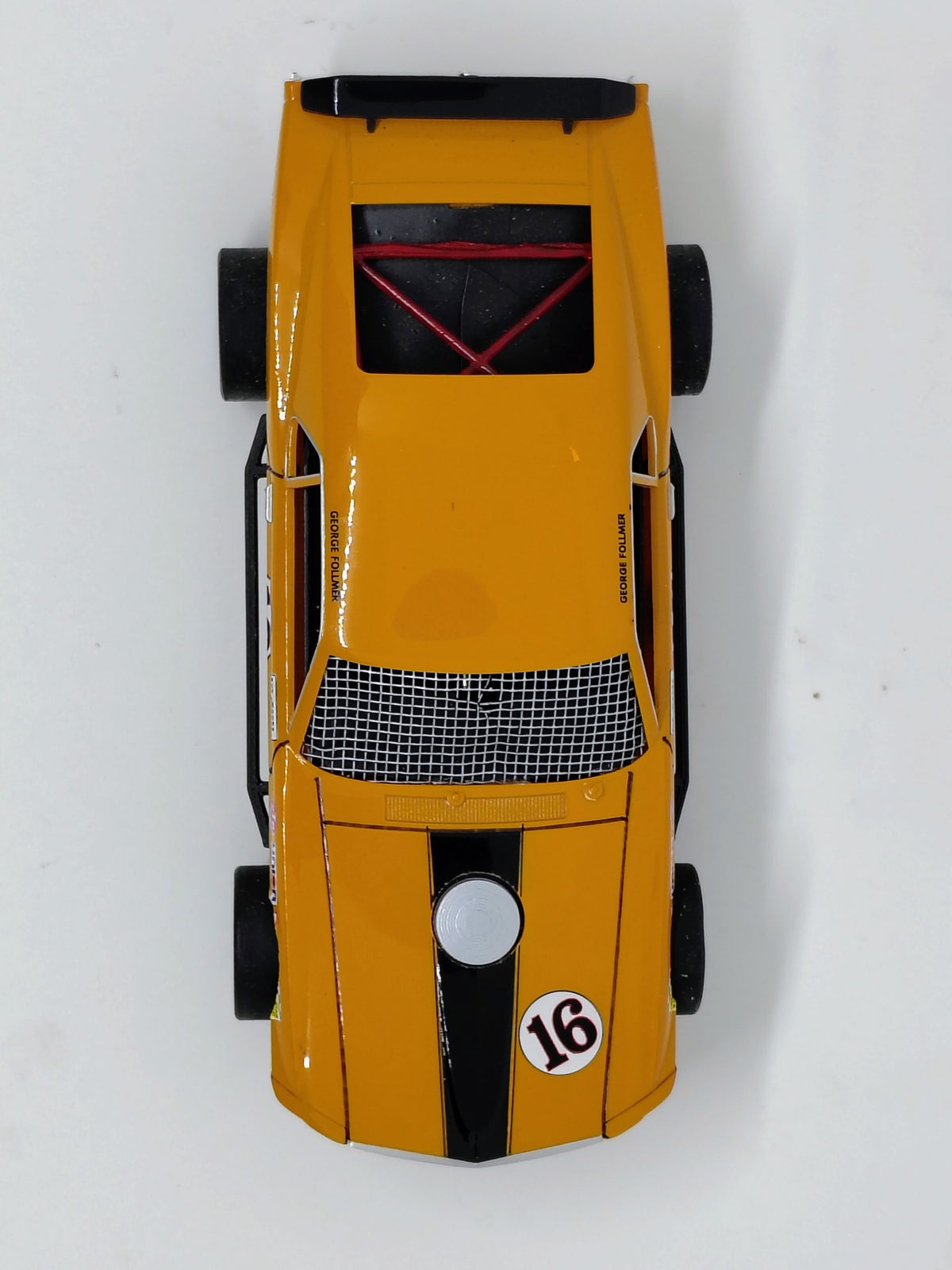 SLOTRAX George Follmer Boss 302 orange number 16 overhead view
