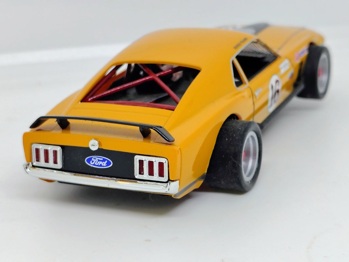 Orange number 16 custom Mustang 1/32 slot car wide rear silicone tires and roll cage