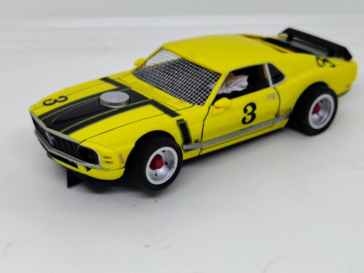 Yellow #3 SlotTrax Mustang modified racing front three-quarter with mesh screen and scoop