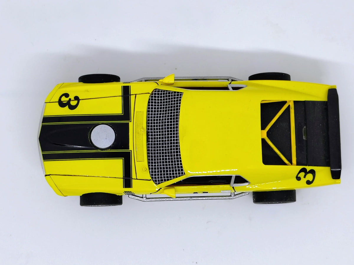 Yellow SLOTRAX Mustang modified #3 top view showing cage and intake