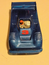 Front of vintage metallic blue number 3 slot car