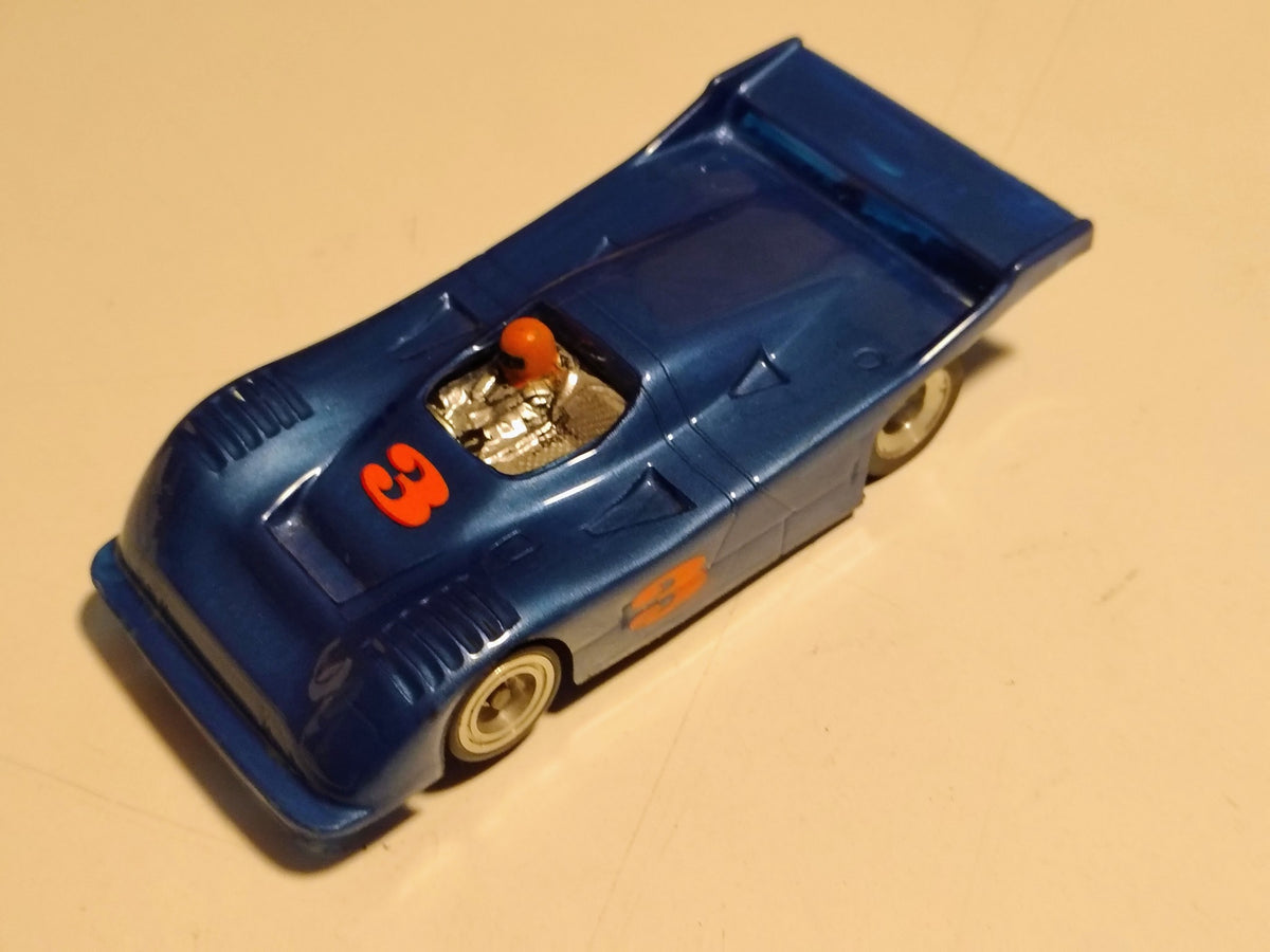Metallic-blue number 3 Can-Am slot car overhead angle