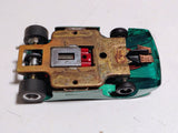 Underside detail vintage brass pan chassis and Pactra Hemi red-endbell motor