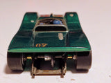 Green 1/32 vintage Can-Am #07 rear view showing gearing and silicone tires