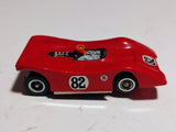 Side profile red Ti-22 #82 slot car with wheel details and driver